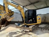 2022 Caterpillar 305.5E2 mini excavator, side view