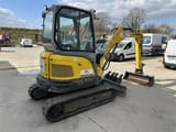 2024 Wacker Neuson EZ26 mini excavator, rear three-quarter view