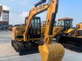 2023 Caterpillar 306E2 mini excavator, front three-quarter view