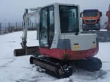 2012 Takeuchi TB250 mini excavator, rear three-quarter view