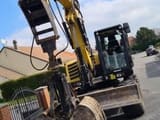 2020 Yanmar B110W wheel excavator, front three-quarter view