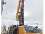 2017 Liebherr LH40 M material handler, rear three-quarter view