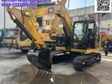 2023 Caterpillar 307.5 mini excavator, front three-quarter view