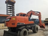 2020 Doosan DX150W-9C wheel excavator, rear three-quarter view