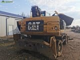 2008 Caterpillar M318D material handler rear view