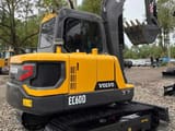 2018 Volvo EC60D mini excavator, rear three-quarter view