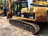 Caterpillar 323D crawler excavator, rear three-quarter view