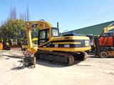 2023 Caterpillar 320B crawler excavator, rear three-quarter view