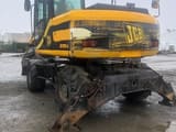 2001 JCB JS130W wheel excavator rear three-quarter view
