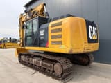 2012 Caterpillar 323EL crawler excavator, rear three-quarter view