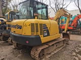2012 Komatsu PC56-7 mini excavator, rear three-quarter view