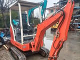 2001 Schaeff HR13 mini excavator, rear three-quarter view