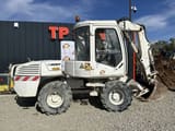 2005 Mecalac 12MXT wheel excavator side view