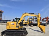 2023 Caterpillar 308.5E2 mini excavator, side profile view