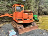 1985 Schaeff HR26 crawler excavator, rear three-quarter view