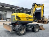 2019 Wacker Neuson EW100 wheel excavator rear three-quarter view