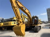 2012 Caterpillar 320BL crawler excavator, front three-quarter view