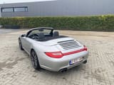 2009 Porsche 997.2 4S convertible rear three-quarter view