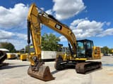 2022 Caterpillar 320GC crawler excavator, side profile view