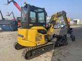 2024 Komatsu PC33E-6 mini excavator, rear three-quarter view