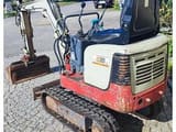 2009 Takeuchi TB108 mini excavator, rear three-quarter view