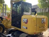 2024 Caterpillar 306E2 crawler excavator, rear three-quarter view