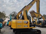 Caterpillar 312D2 GC crawler excavator, rear three-quarter view