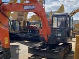 2019 Doosan DH55-V mini excavator, front three-quarter view