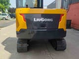 2026 LiuGong 906FG4 Mini Excavator, rear view, highlighting the counterweight with the LiuGong logo and black rubber tracks.
