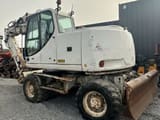 2005 CASE WX165 wheel excavator, rear three-quarter view