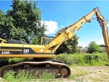 2000 Caterpillar 330BL crawler excavator, side view