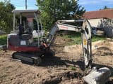 2012 Takeuchi TB219 mini excavator, side profile view