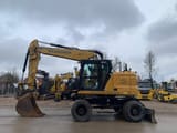 2023 Caterpillar M317-07B wheel excavator side view