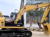 2022 Caterpillar 313D2 GC crawler excavator side view