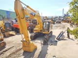 2023 Caterpillar 320B crawler excavator, front three-quarter view
