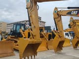2022 Caterpillar 323D2L crawler excavator, front three-quarter view