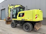 2015 Caterpillar M320F wheel excavator, rear three-quarter view