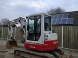 2018 Takeuchi TB153FR mini excavator, rear three-quarter view