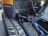 2020 Volvo ECR88D mini excavator, close-up of the boom swing cylinder and tracks