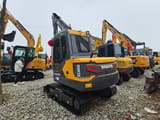 2022 Volvo EC60D mini excavator, rear three-quarter view