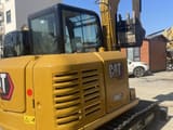 2024 Caterpillar 306E2 mini excavator rear three-quarter view