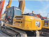 2023 Caterpillar 315D2 crawler excavator, rear three-quarter view
