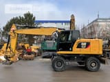 2015 Caterpillar M318F wheel excavator side view