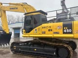 Komatsu PC450-7 crawler excavator, side profile view