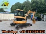 2010 Caterpillar 304CCR mini excavator, rear three-quarter view