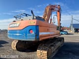 2010 Doosan DX300LC crawler excavator, rear three-quarter view
