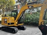 2024 Caterpillar 306E2 mini excavator, side view
