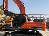 2022 Doosan DX300LC crawler excavator, side view