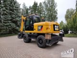 2012 Caterpillar M313D wheel excavator, rear three-quarter view