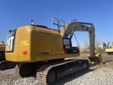 2024 Caterpillar 320EL crawler excavator rear three-quarter view
